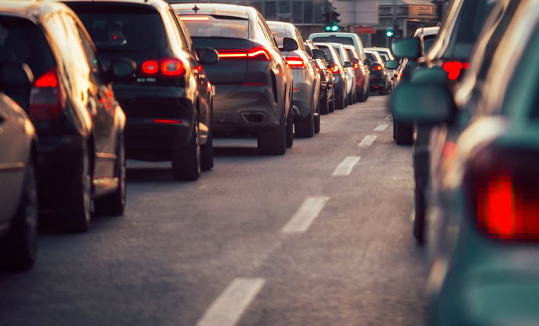 Blurry image of traffic jam cars in city
