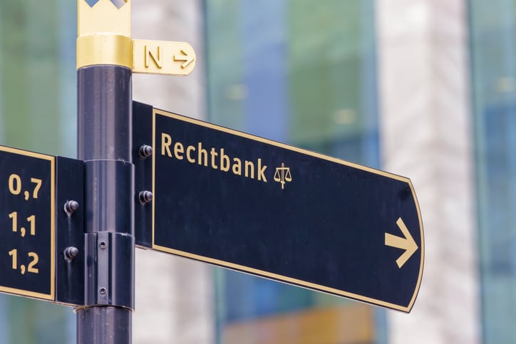 Direction sign with the Dutch text for Court House in Amsterdam