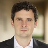  Professional headshot of David Walker, Senior Legal Counsel at Deminor Litigation Funding. 