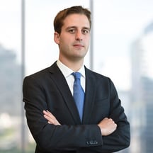 Professional headshot of Valentin Orts, Claims Management Lead at Deminor Litigation Funding. 